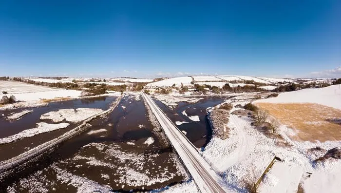 Framed Print : Aerial view of snowy landscape and river Framed Print : Aerial view of snowy landscape and river