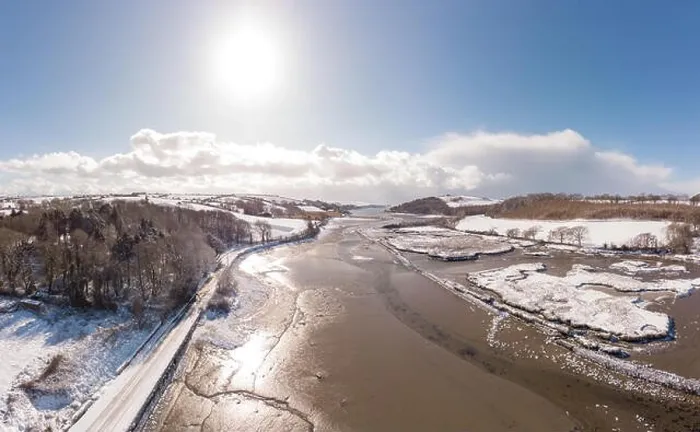 Framed Print : Aerial view of snowy landscape and river Framed Print : Aerial view of snowy landscape and river