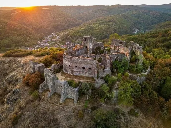 Framed Print : Aerial view of the Soimos citadel ruin at sunset. Photo taken on 26th of August 2024, near Lipova, Arad County, Romania Framed Print : Aerial view of the Soimos citadel ruin at sunset. Photo taken on 26th of August 2024, near Lipova, Arad County, Romania