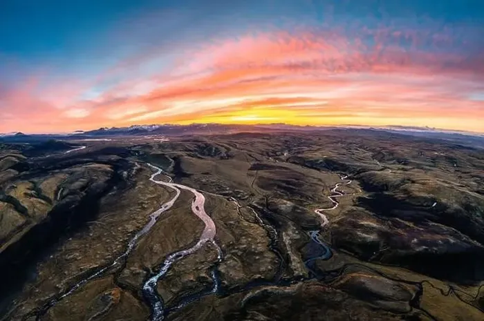 Framed Print : Aerial view of Spectacular moss on lava field with river flowing in Icelandic highlands on wilderness in the sunset Framed Print : Aerial view of Spectacular moss on lava field with river flowing in Icelandic highlands on wilderness in the sunset