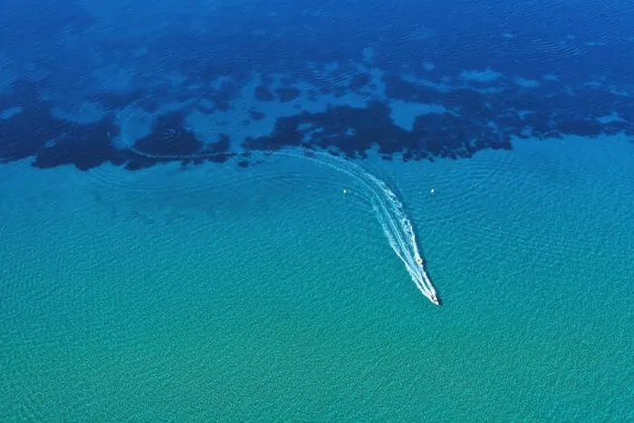 Framed Print : Aerial view of speed boat in motion. Water transportation and summer leisure time activity Framed Print : Aerial view of speed boat in motion. Water transportation and summer leisure time activity
