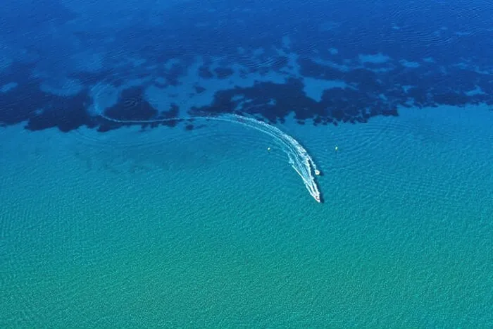 Framed Print : Aerial view of speed boat in motion. Water transportation and summer leisure time activity Framed Print : Aerial view of speed boat in motion. Water transportation and summer leisure time activity