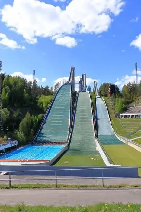 Framed Print : Aerial view of sports centre with three ski jump towers in the summer, Lahti in Finland Framed Print : Aerial view of sports centre with three ski jump towers in the summer, Lahti in Finland
