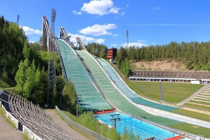 Framed Print : Aerial view of sports centre with three ski jump towers in the summer, Lahti in Finland Framed Print : Aerial view of sports centre with three ski jump towers in the summer, Lahti in Finland