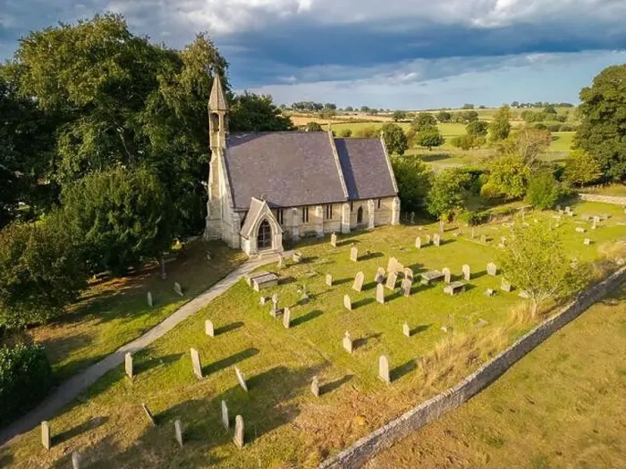 Framed Print : Aerial View of St. Wilfrid's Church in South Stainley, North Yorkshire, Under Dramatic Skies Framed Print : Aerial View of St. Wilfrid's Church in South Stainley, North Yorkshire, Under Dramatic Skies