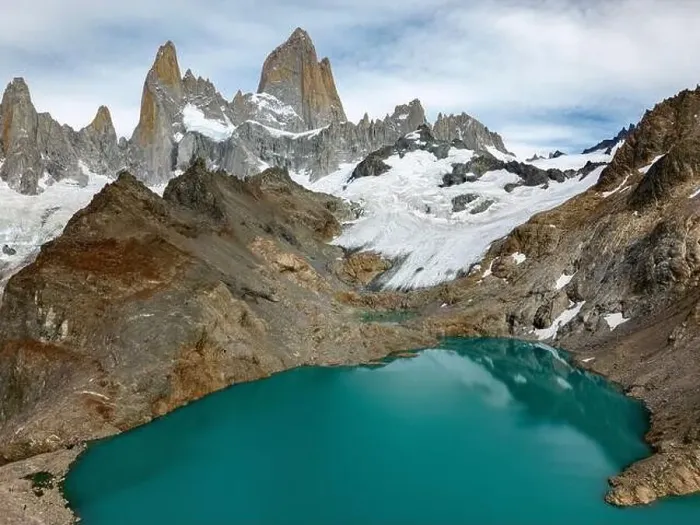 Framed Print : Aerial view of the stunning Laguna de los Tres with its turquoise waters surrounded by Mount Fitz Roy Framed Print : Aerial view of the stunning Laguna de los Tres with its turquoise waters surrounded by Mount Fitz Roy