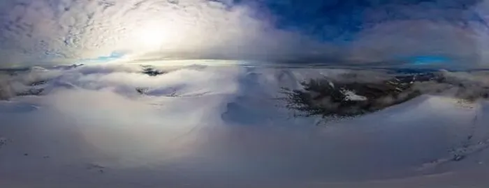 Framed Print : Aerial view of the stunning winter panorama of the snowy slopes and hills among the lush white clouds Framed Print : Aerial view of the stunning winter panorama of the snowy slopes and hills among the lush white clouds