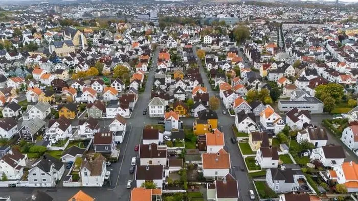 Framed Print : Aerial view of a suburban neighborhood with colorful houses and tree-lined streets Framed Print : Aerial view of a suburban neighborhood with colorful houses and tree-lined streets