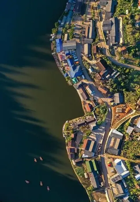 Framed Print : Aerial view of Sunrise with fog over Ban Rak thai, chinese village near a lake in Mae Hong Son, Thailand Framed Print : Aerial view of Sunrise with fog over Ban Rak thai, chinese village near a lake in Mae Hong Son, Thailand