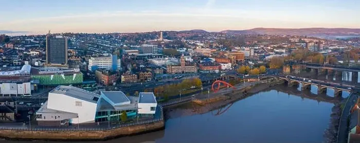 Framed Print : An aerial view at sunrise of Newport city centre, south wales United Kingdom, taken from the River Usk Framed Print : An aerial view at sunrise of Newport city centre, south wales United Kingdom, taken from the River Usk
