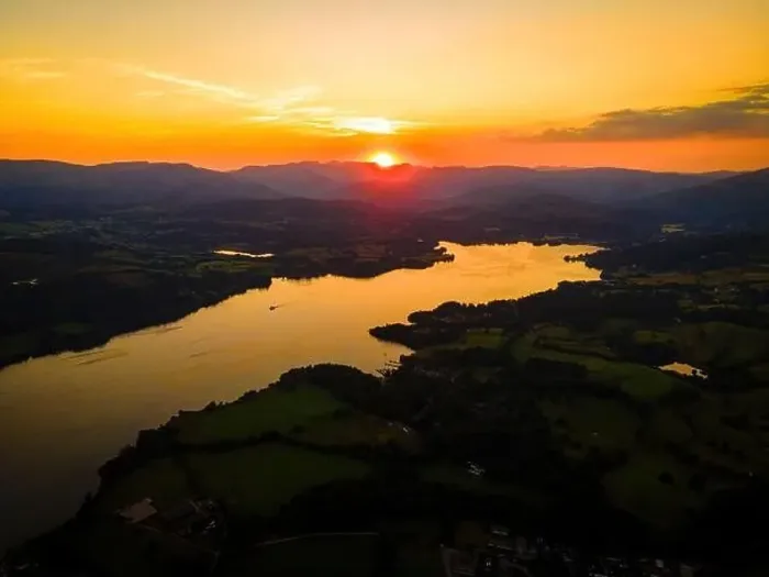 Framed Print : Aerial view of sunset over Windermere in Lake District, a region and national park in Cumbria in northwest England, UK Framed Print : Aerial view of sunset over Windermere in Lake District, a region and national park in Cumbria in northwest England, UK