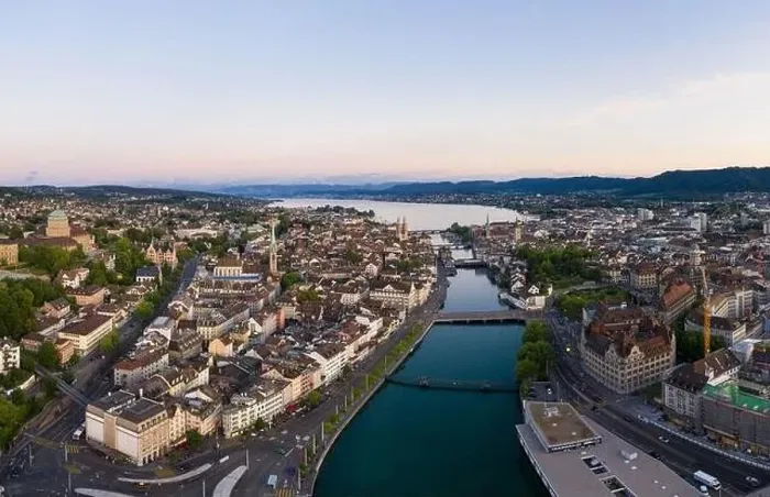 Framed Print : Aerial view of the sunset over Zurich old town and dwontown district with the Limmat river Framed Print : Aerial view of the sunset over Zurich old town and dwontown district with the Limmat river