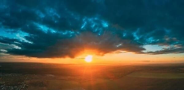 Aerial View Of Sunshine In Sunrise Bright Dramatic Sky. Scenic Colorful Sky At Dawn. Sunset Sky Above Autumn Field And Meadow, Forest Landscape In Eve