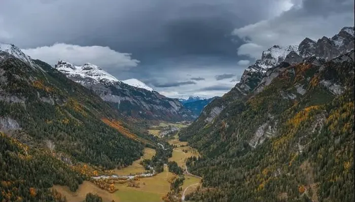Framed Print : An aerial view of the Tamina Valley in late autumn with the first snow on the mountain tops Framed Print : An aerial view of the Tamina Valley in late autumn with the first snow on the mountain tops