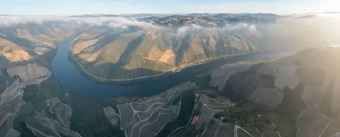 Framed Print : Aerial view of the terraced vineyards in romantic sunset in the Douro Valley near the village of Pinhao