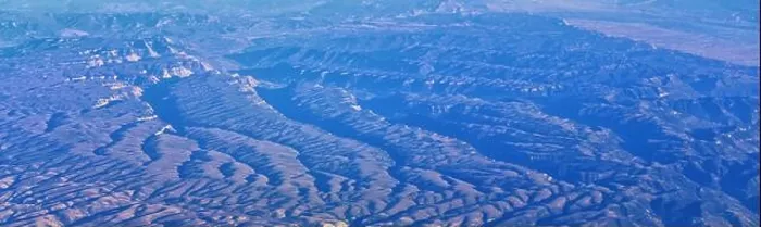 Framed Print : Aerial view of topographical Rocky Mountain landscapes on flight over Colorado and Utah during autumn Framed Print : Aerial view of topographical Rocky Mountain landscapes on flight over Colorado and Utah during autumn
