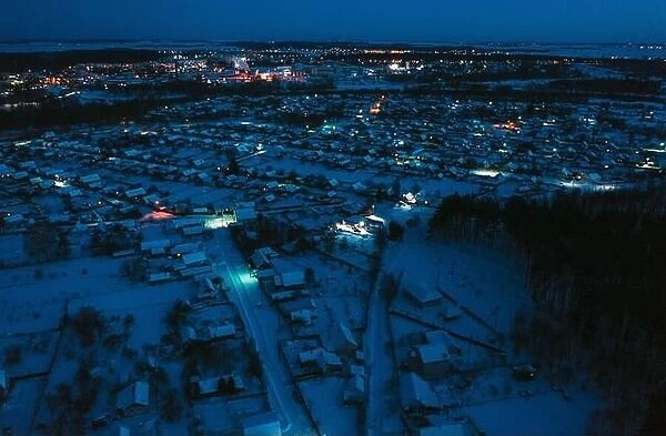 Aerial View Of Town Skyline Winter Night. Snowy Landscape Cityscape Skyline