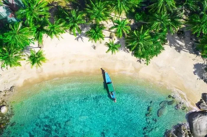 Framed Print : Aerial view of tropical beach and longtail boat, koh Tao, Thailand Framed Print : Aerial view of tropical beach and longtail boat, koh Tao, Thailand