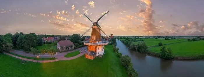 Framed Print : Aerial view of twin mills at Alte Greetsieler Sieltief, Greetsiel, Lower Saxony, Germany, Europe Framed Print : Aerial view of twin mills at Alte Greetsieler Sieltief, Greetsiel, Lower Saxony, Germany, Europe