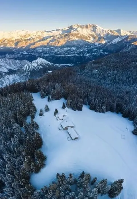 Framed Print : Aerial view of the Valmezzana hut and Presolana massif during a winter sunrise from Monte Pora Framed Print : Aerial view of the Valmezzana hut and Presolana massif during a winter sunrise from Monte Pora