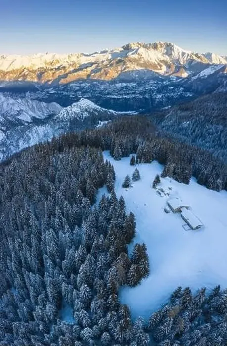 Framed Print : Aerial view of the Valmezzana hut and Presolana massif during a winter sunrise from Monte Pora Framed Print : Aerial view of the Valmezzana hut and Presolana massif during a winter sunrise from Monte Pora