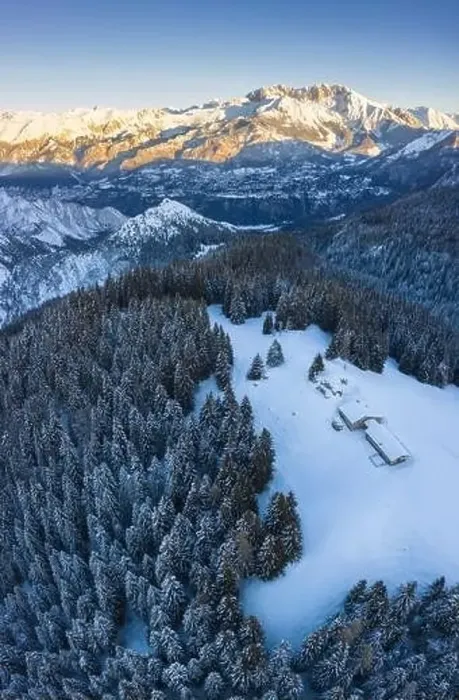 Framed Print : Aerial view of the Valmezzana hut and Presolana massif during a winter sunrise from Monte Pora Framed Print : Aerial view of the Valmezzana hut and Presolana massif during a winter sunrise from Monte Pora