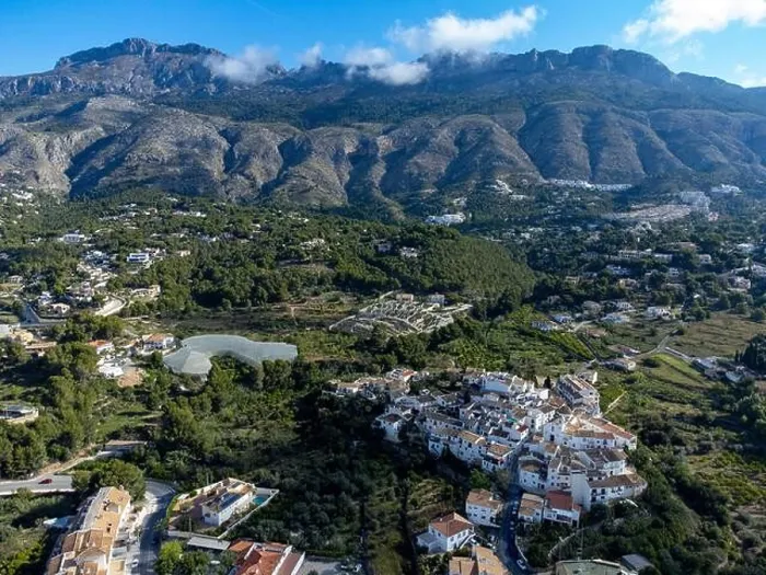 Framed Print : Aerial view of the village of Altea La Vella ( Altea La Vieja) in front of the Sierra Bernia mountain range near the town of Altea on the Costa Framed Print : Aerial view of the village of Altea La Vella ( Altea La Vieja) in front of the Sierra Bernia mountain range near the town of Altea on the Costa