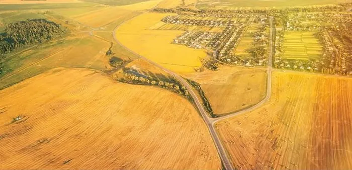 Framed Print : Aerial View Of Village And Hay Rolls, Straw Field Landscape In Summer Evening. Haystack, Hay Roll in Sunrise Time. Agricultural Countryside landscape Framed Print : Aerial View Of Village And Hay Rolls, Straw Field Landscape In Summer Evening. Haystack, Hay Roll in Sunrise Time. Agricultural Countryside landscape