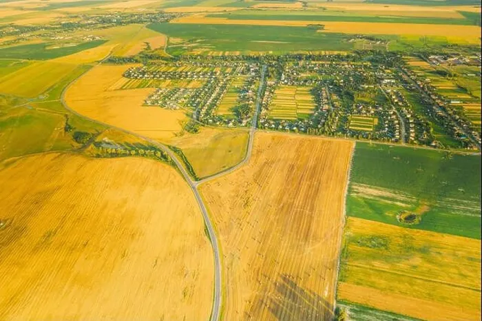Framed Print : Aerial View Of Village And Hay Rolls, Straw Field Landscape In Summer Evening. Haystack, Hay Roll in Sunrise Time. Agricultural Countryside landscape Framed Print : Aerial View Of Village And Hay Rolls, Straw Field Landscape In Summer Evening. Haystack, Hay Roll in Sunrise Time. Agricultural Countryside landscape