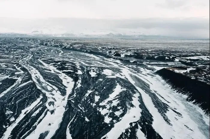 Framed Print : Aerial view of the volcanic desert on Iceland, in the background a glacier, black rock, filming location Interstellar Framed Print : Aerial view of the volcanic desert on Iceland, in the background a glacier, black rock, filming location Interstellar