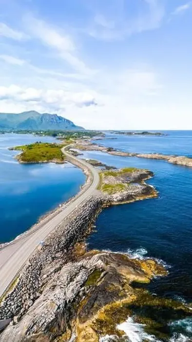 Framed Print : Aerial view of a winding road leading through a scenic archipelago in Norway. Atlantic Ocean Road Norway Framed Print : Aerial view of a winding road leading through a scenic archipelago in Norway. Atlantic Ocean Road Norway