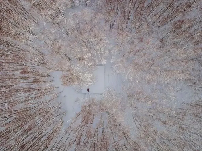 Framed Print : Aerial view of a winter snow-covered pine forest. Aerial drone view of a winter landscape. Snow covered forest Framed Print : Aerial view of a winter snow-covered pine forest. Aerial drone view of a winter landscape. Snow covered forest