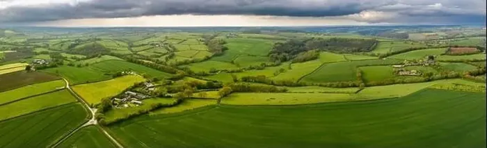 Framed Print : Aerial vista of rolling countryside near the village of Coldridge, Devon, England, United Kingdom, Europe Framed Print : Aerial vista of rolling countryside near the village of Coldridge, Devon, England, United Kingdom, Europe