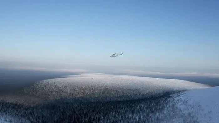 Framed Print : Aerial winter view of giants of the Manpupuner Plateau, Komi Republic. Clip. Helicopter flying above snow covered hills Framed Print : Aerial winter view of giants of the Manpupuner Plateau, Komi Republic. Clip. Helicopter flying above snow covered hills
