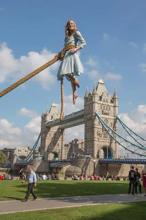 Framed Print : Aerialist Sally Miller in the character of Emma Bloom takes flight with the backdrop of the Tower Bridge to promote Framed Print : Aerialist Sally Miller in the character of Emma Bloom takes flight with the backdrop of the Tower Bridge to promote