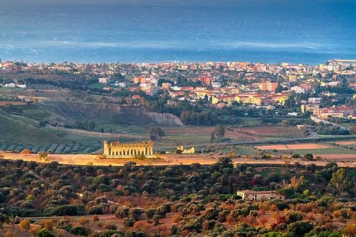 Framed Print : Agrigento, Sicily, Italy cityscape towards the Valley of the Temples and the Mediterranean at dawn Framed Print : Agrigento, Sicily, Italy cityscape towards the Valley of the Temples and the Mediterranean at dawn