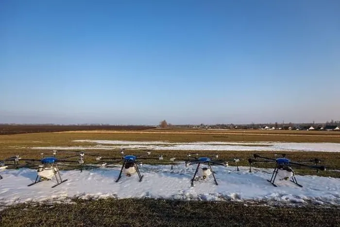 Framed Print : Many agrodrones are on the green field. The snow has not melted yet. Agrodrons are ready to spray fertilizer Framed Print : Many agrodrones are on the green field. The snow has not melted yet. Agrodrons are ready to spray fertilizer