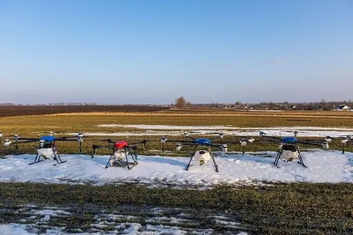 Framed Print : Many agrodrones are on the green field. The snow has not melted yet. Agrodrons are ready to spray fertilizer Framed Print : Many agrodrones are on the green field. The snow has not melted yet. Agrodrons are ready to spray fertilizer