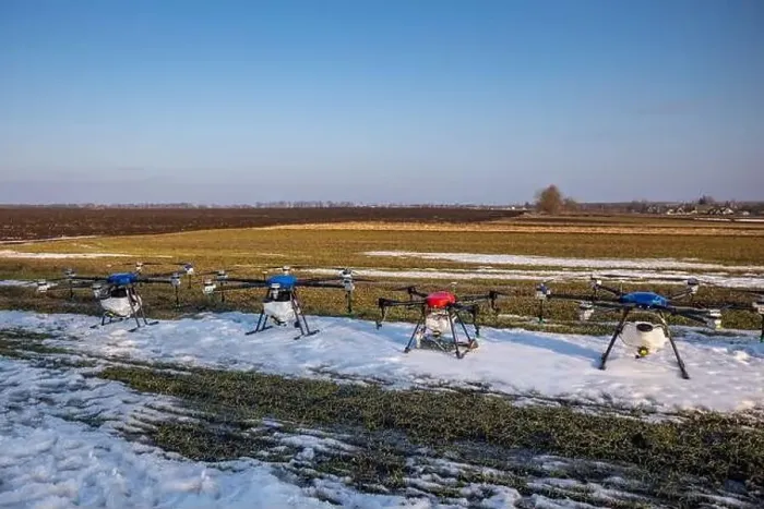 Framed Print : Many agrodrones are on the green field. The snow has not melted yet. Agrodrons are ready to spray fertilizer Framed Print : Many agrodrones are on the green field. The snow has not melted yet. Agrodrons are ready to spray fertilizer
