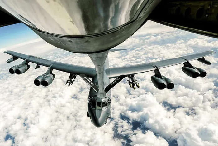 Framed Print : Air Force B-52 Stratofortress refuels from a 340th Expeditionary Air Refueling Squadron KC-135 Stratotanker Framed Print : Air Force B-52 Stratofortress refuels from a 340th Expeditionary Air Refueling Squadron KC-135 Stratotanker