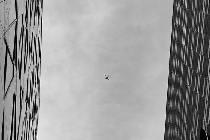 Framed Print : Airplane framed by architecture in Oslo, Norway Framed Print : Airplane framed by architecture in Oslo, Norway