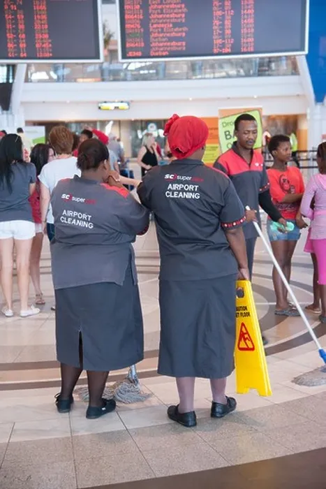 Framed Print : Airport cleaners from the Supercare Company at Cape Town Airport South Africa Framed Print : Airport cleaners from the Supercare Company at Cape Town Airport South Africa