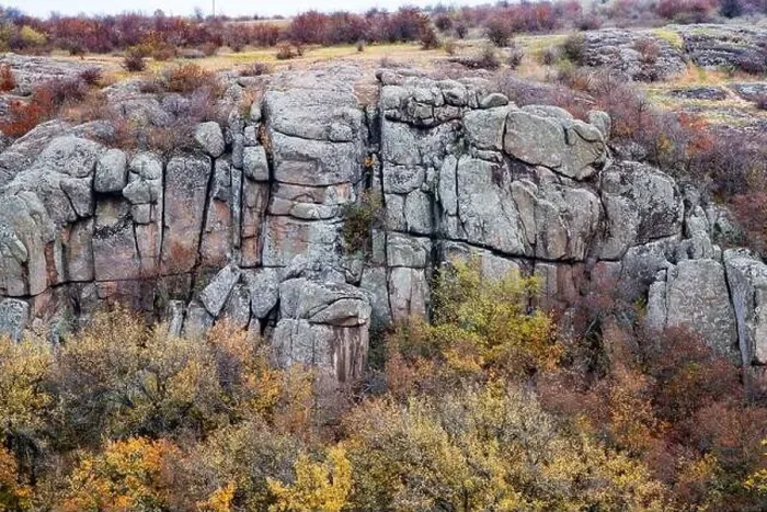 Framed Print : Aktovsky Canyon, Ukraine. Autumn trees and large stone boulders around Framed Print : Aktovsky Canyon, Ukraine. Autumn trees and large stone boulders around