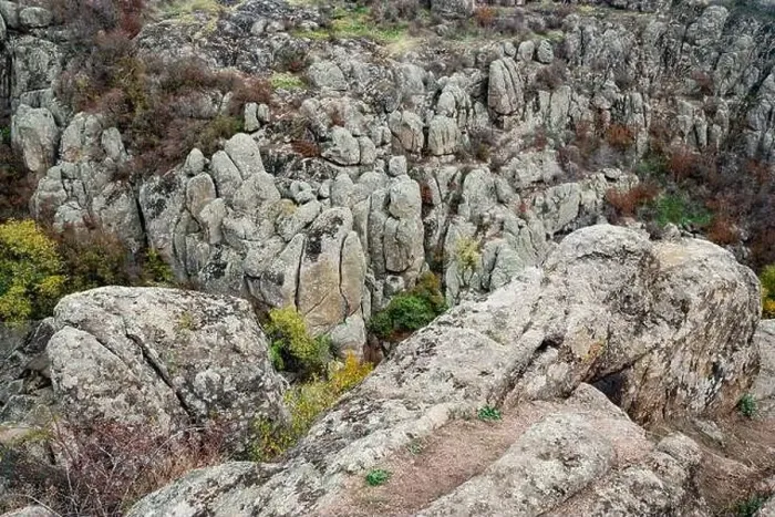 Framed Print : Aktovsky Canyon, Ukraine. Autumn trees and large stone boulders around