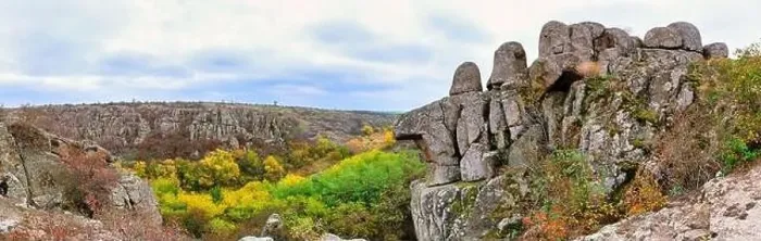 Framed Print : Aktovsky Canyon, Ukraine. Autumn trees and large stone boulders around Framed Print : Aktovsky Canyon, Ukraine. Autumn trees and large stone boulders around