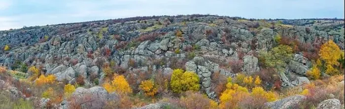 Framed Print : Aktovsky Canyon, Ukraine. Autumn trees and large stone boulders around Framed Print : Aktovsky Canyon, Ukraine. Autumn trees and large stone boulders around
