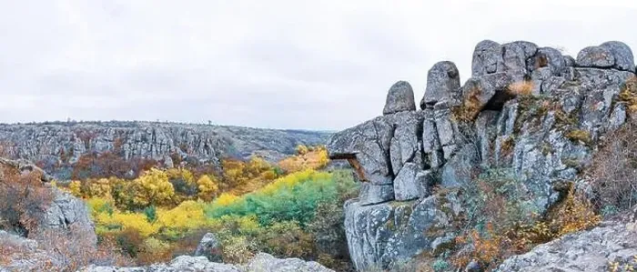 Framed Print : Aktovsky Canyon, Ukraine. Autumn trees and large stone boulders around Framed Print : Aktovsky Canyon, Ukraine. Autumn trees and large stone boulders around