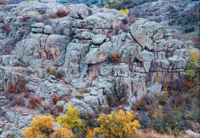 Framed Print : Aktovsky Canyon, Ukraine. Autumn trees and large stone boulders around Framed Print : Aktovsky Canyon, Ukraine. Autumn trees and large stone boulders around