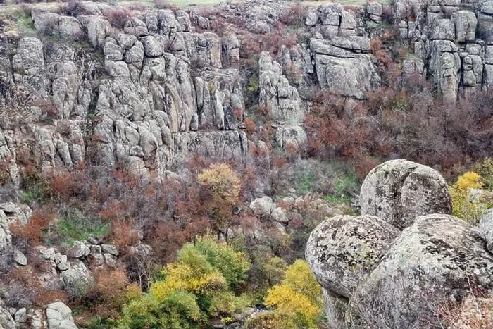 Framed Print : Aktovsky Canyon, Ukraine. Autumn trees and large stone boulders around Framed Print : Aktovsky Canyon, Ukraine. Autumn trees and large stone boulders around