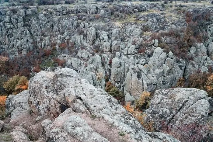 Framed Print : Aktovsky Canyon, Ukraine. Autumn trees and large stone boulders around Framed Print : Aktovsky Canyon, Ukraine. Autumn trees and large stone boulders around